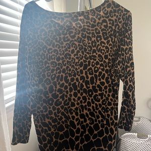 Cheetah print sweater .